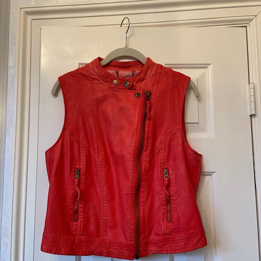 Red vest for Baby Angel by Elio Fiorucci